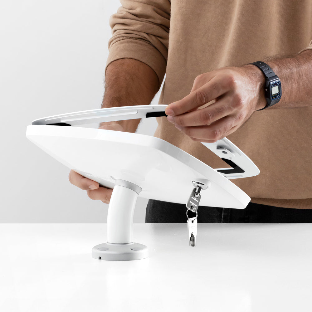 Bouncepad Swivel Desk - A secure rotating tablet & iPad desk mount in white.